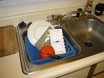 Cessna 177B Cardinal cowl flaps in the sink of a bachelor kitchen