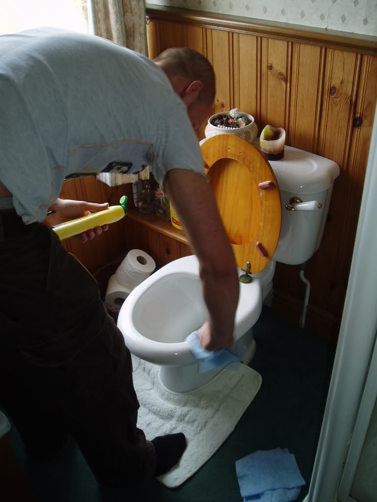 Cleaning the toilet