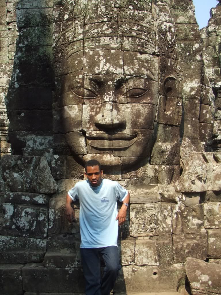 Me in front of one of the several faces in Bayon